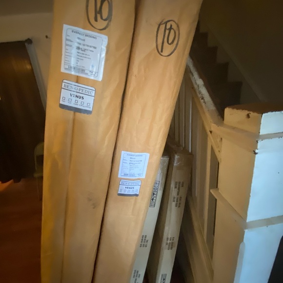 Two brand new mattresses and frames never opened.